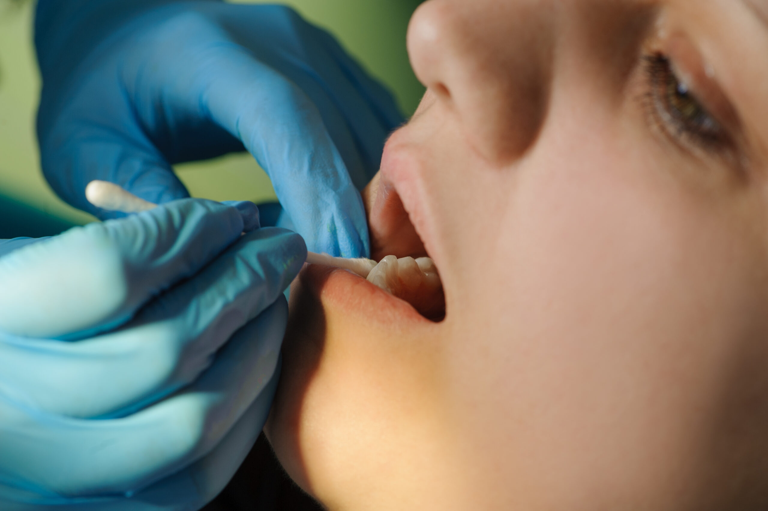 Child undergoing dental procedure.