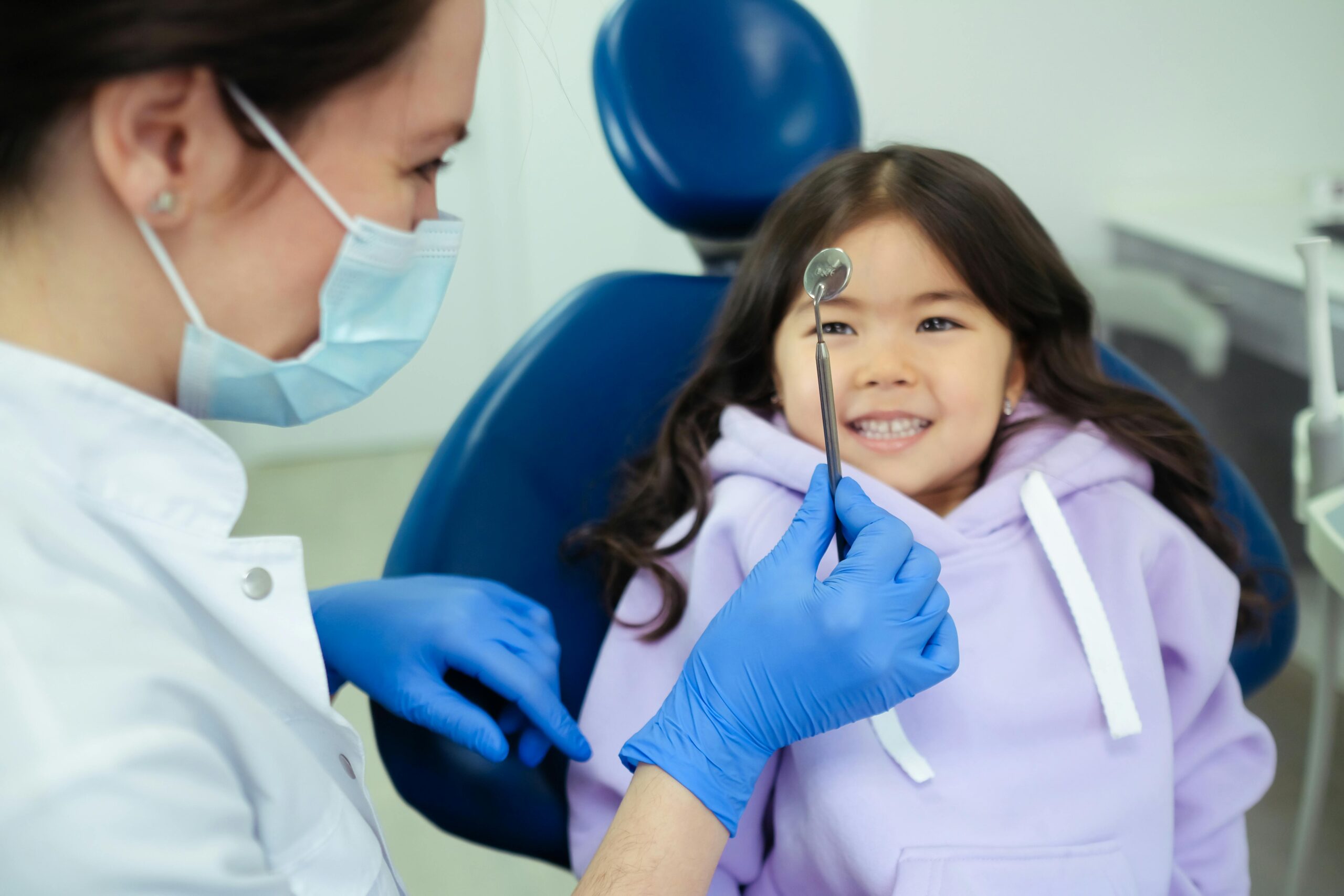 Happy child at a dentist appointment.